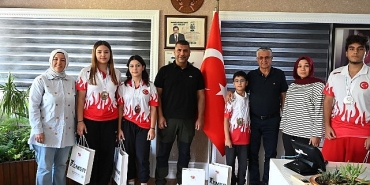milli-sporculardan-baskan-topalogluna-ziyaret.jpg